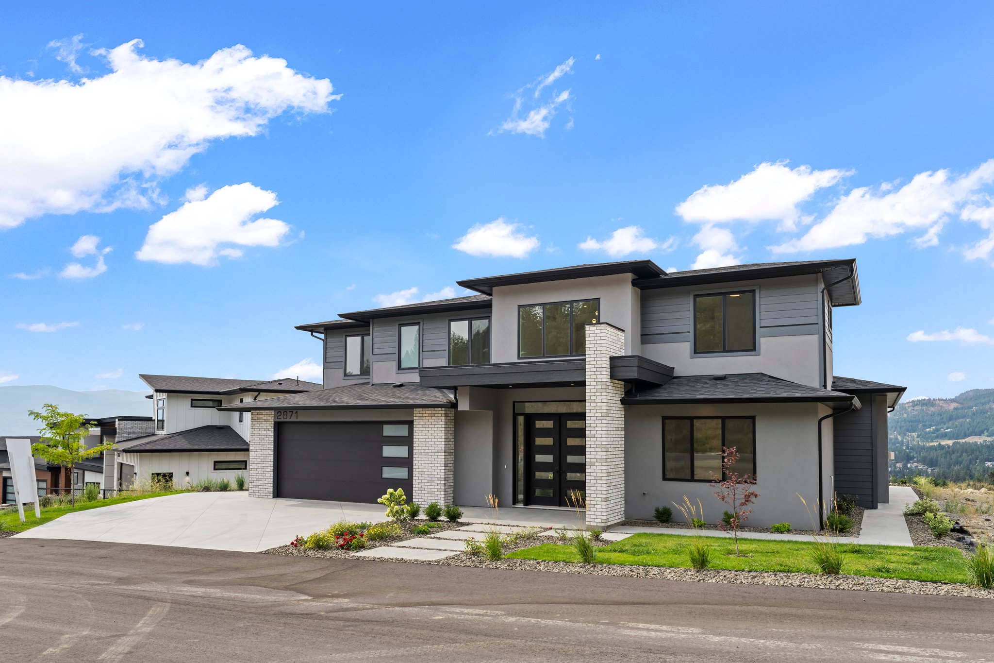 Angled exterior view of Copper Ridge Residence in West Kelowna