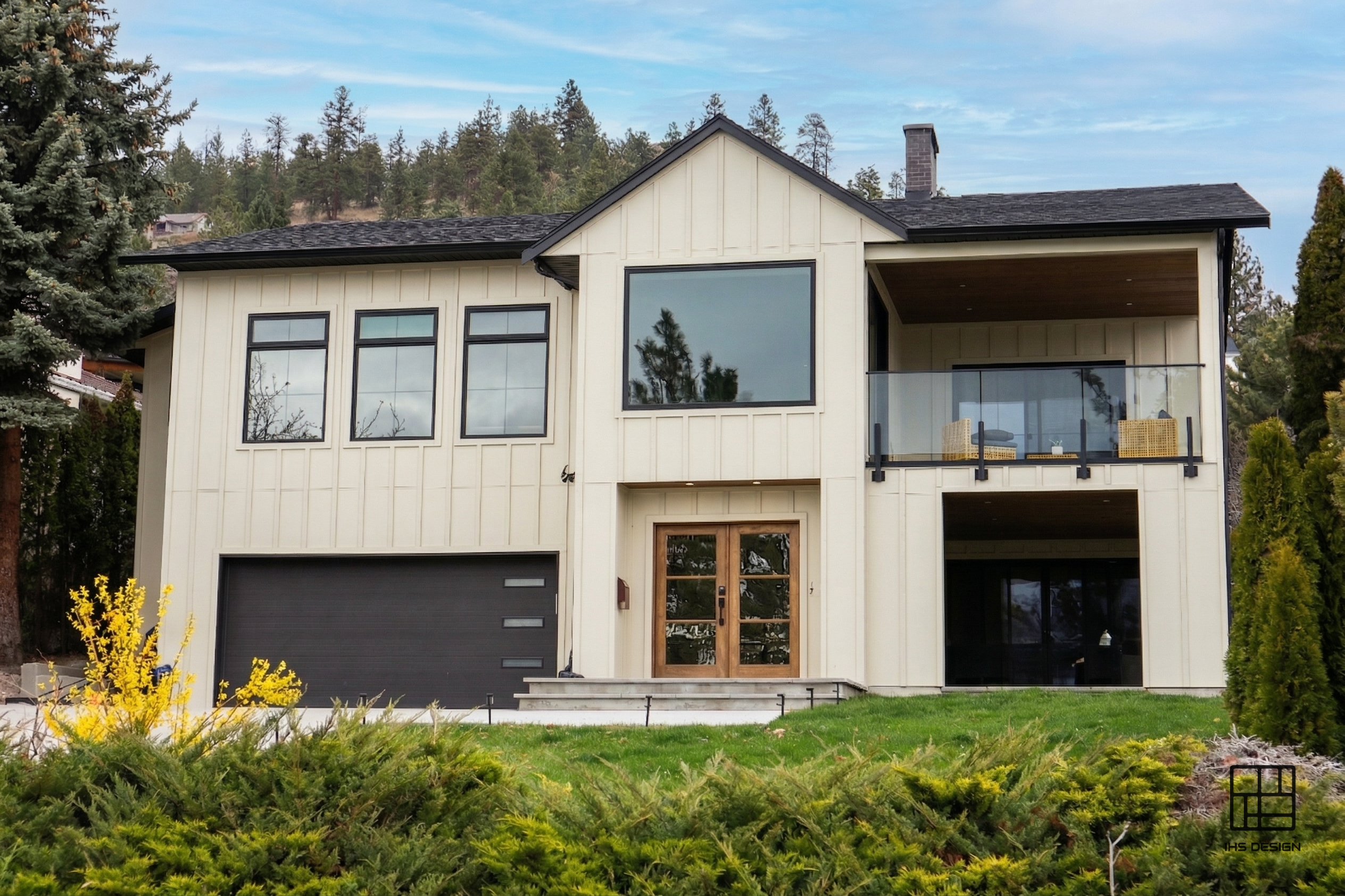 Finished front exterior of the Gregory project, showing the home as built.